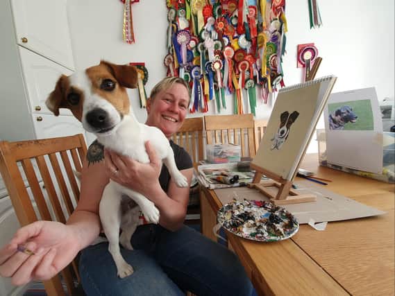 Gill's current work set-up with Drax the Jack Russell