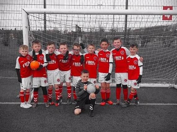 Fleetwood Junior Reds Under-8s have thrown themselves into their fundraising challenge