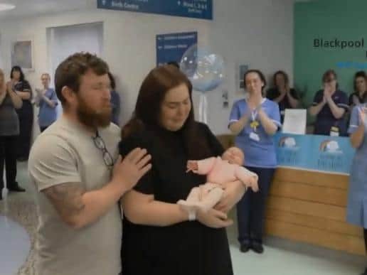 Katherine and Stuart Dawson, both 36, from Garstang, and their newborn daughter Ruby were given a guard of honour by medics at Blackpool Victoria Hospital on Monday, May 4, 2020, after Katherine and Ruby's discharge. Katherine had an emergency C-section and spent eight days on a ventilator are falling seriously ill with the coronavirus Covid-19. Ruby was also diagnosed with the disease but showed no symptoms (Picture: Blackpool Teaching Hospitals NHS Foundation Trust)
