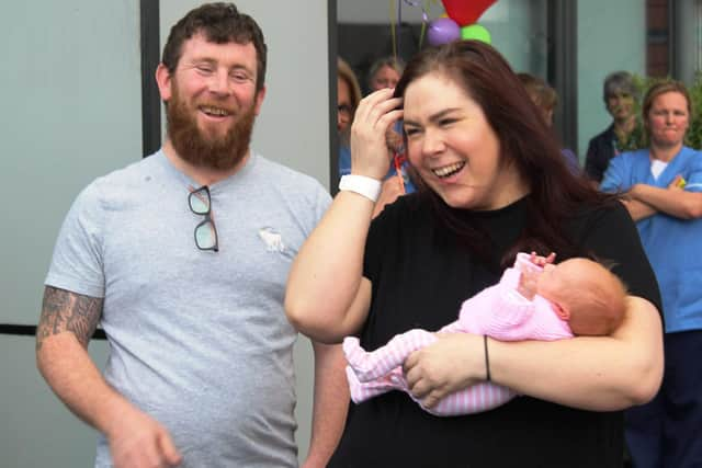 Katherine and Stuart Dawson, both 36, from Garstang, and their newborn daughter Ruby were given a guard of honour by medics at Blackpool Victoria Hospital on Monday, May 4, 2020, after Katherine and Ruby's discharge. Katherine had an emergency C-section and spent eight days on a ventilator are falling seriously ill with the coronavirus Covid-19. Ruby was also diagnosed with the disease but showed no symptoms (Picture: Blackpool Teaching Hospitals NHS Foundation Trust)