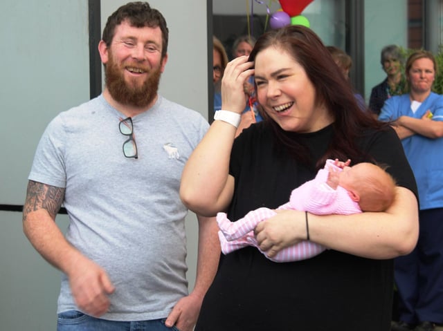 Katherine and Stuart Dawson, both 36, from Garstang, and their newborn daughter Ruby were given a guard of honour by medics at Blackpool Victoria Hospital on Monday, May 4, 2020, after Katherine and Ruby's discharge. Katherine had an emergency C-section and spent eight days on a ventilator are falling seriously ill with the coronavirus Covid-19. Ruby was also diagnosed with the disease but showed no symptoms (Picture: Blackpool Teaching Hospitals NHS Foundation Trust)