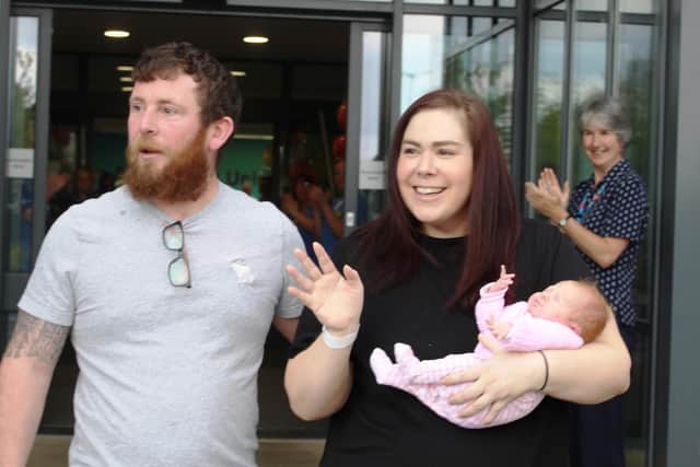 Katherine and Stuart Dawson, both 36, from Garstang, and their newborn daughter Ruby were given a guard of honour by medics at Blackpool Victoria Hospital on Monday, May 4, 2020, after Katherine and Ruby's discharge. Katherine had an emergency C-section and spent eight days on a ventilator are falling seriously ill with the coronavirus Covid-19. Ruby was also diagnosed with the disease but showed no symptoms (Picture: Blackpool Teaching Hospitals NHS Foundation Trust)