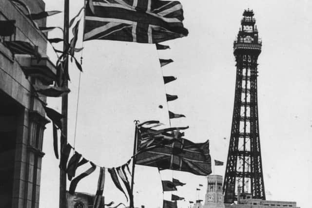 Flags flew proudly in the promenade. Notice the top of the tower is missing as it was used as a radar station during the war