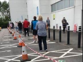 The queue for shoppers at the Sainsbury store in Bamber Bridge.