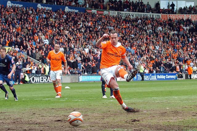 Charlie Adam strokes home Blackpool's second goal from the penalty spot