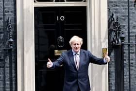 Mr Johnson is planning to urge workers who cannot do their jobs from home to begin returning to their workplaces (Photo by John Bond-WPA Pool/Getty Images)