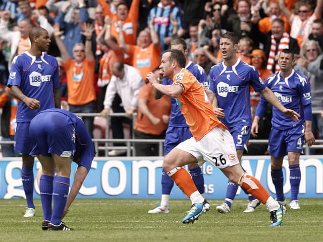 Charlie Adam celebrates scoring Blackpool's winning goal