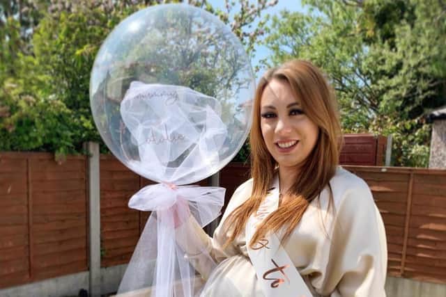Natalie Grey was treated to a surprise drive-by baby shower