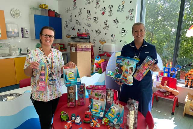 Blackpool Victoria Hospital's Roseanne Norman, play specialist, and Hayley Powers, sister, were delighted with their donations from Mattel after they recognised the good deeds of Grace Brocklehurst from Thornton.