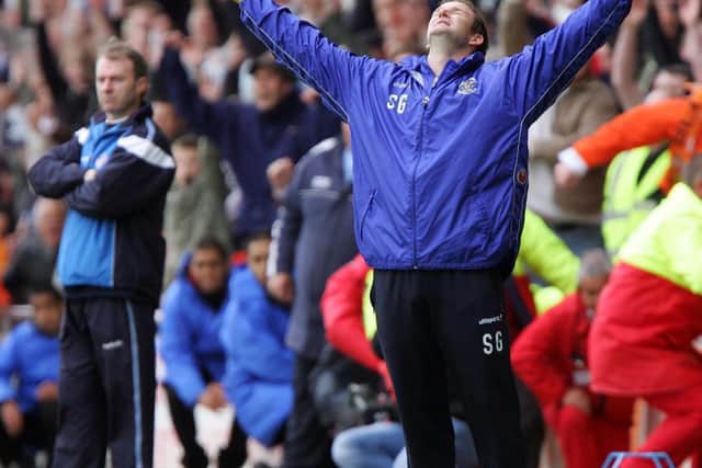 Blackpool boss Simon Grayson celebrates at the full-time whistle
