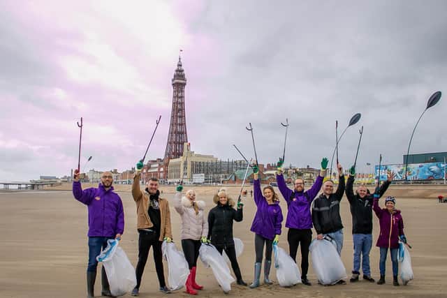 The Viva Blackpool team taking part in a beach clean up to put something back into their town