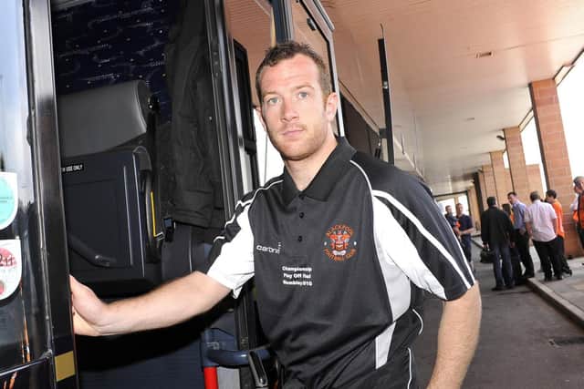 Charlie Adam boards the team bus at Bloomfield Road bound for Wembley