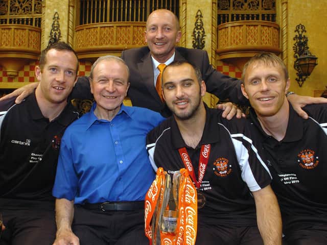Jimmy Armfield celebrates Blackpools promotion with manager Ian Holloway as well as goalscorers Charlie Adam, Gary Taylor-Fletcher and Brett Ormerod
