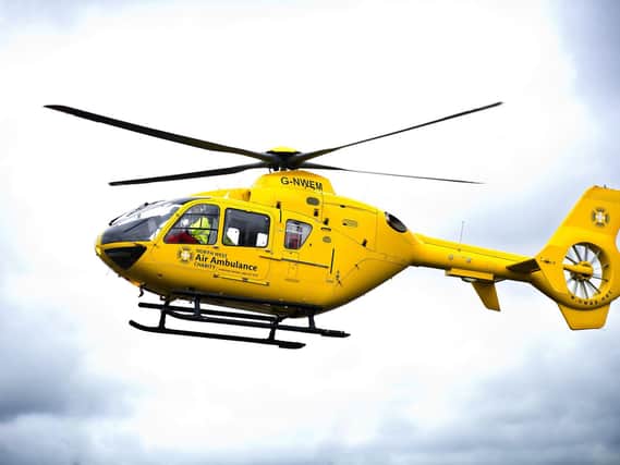 A teenager was taken away in an air ambulance after receiving a head injury on St Annes beach