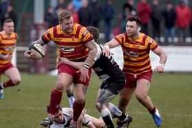 Action from Fylde's last match against Luctonians on March 7 - the club is unsure when its next game will take place