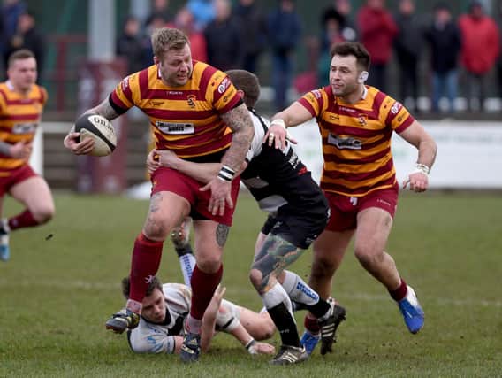 Action from Fylde's last match against Luctonians on March 7 - the club is unsure when its next game will take place