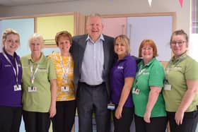 Sir Bill Beaumont with Trinity Hospice staff on being appointed president last year