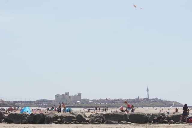 Tourists on the beach at Cleveleys on Friday, May 29, 2020, ahead of lockdown restrictions being eased further. There was no suggestion any of the people pictured were in breach of social distancing rules or lockdown legislation (Picture: Michael Holmes for JPIMedia)