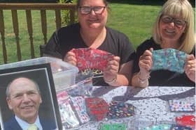 Wendy Radcliffe and Kerry Dewhurst who have been raising money for Trinity Hospice. Wendy, who has been more than running 10K a day and Kerry who has been making face-masks, are pictured with Wendy's husband Paul who was cared for at the hospice before his death last year.