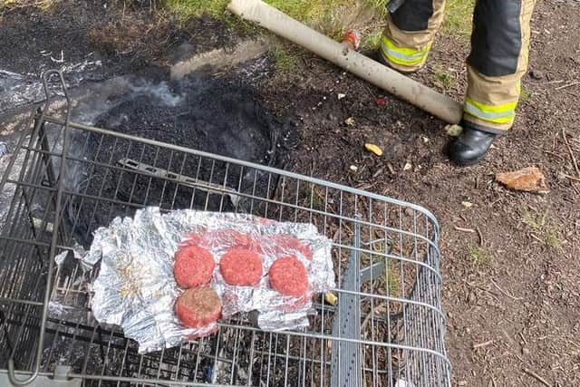A makeshift barbecue made from a tyre which had been set alight and an upside down trolley was discovered by firefighters. (Credit: @blackpool_fire)