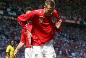 England's Peter Crouch celebrating his second goal during the friendly international against Jamaica at Old Trafford