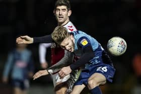 Jason McCarthy in action against Fleetwood Town on their visit to Wycombe in February