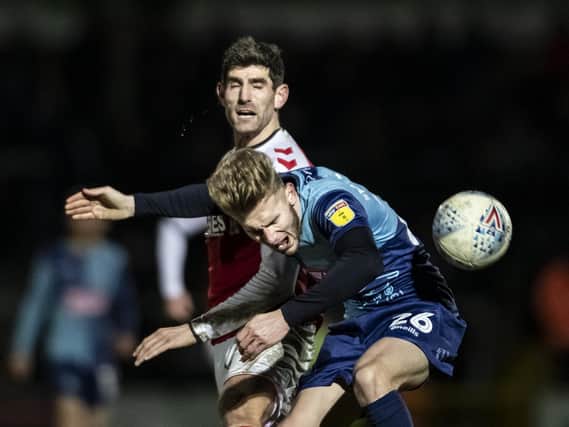 Jason McCarthy in action against Fleetwood Town on their visit to Wycombe in February