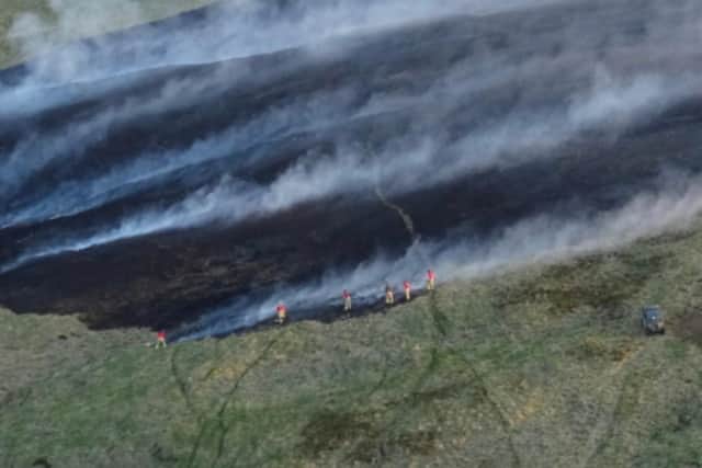 The wildfire which has decimated acres of moorland on Darwen Moor had been caused by a disposable BBQ