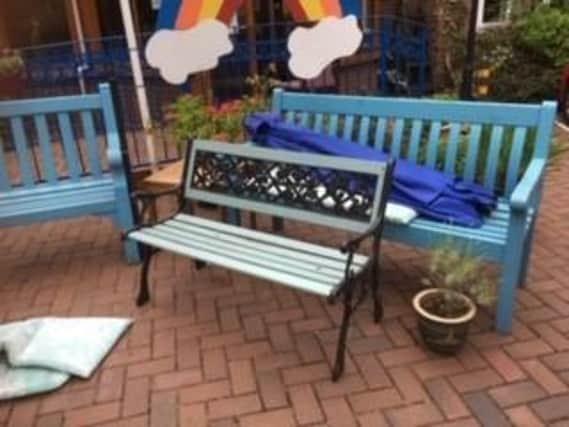 The Lions provided an extra bench (front) for the new garden of remembrance at the Alexandra Court care home in Thornton