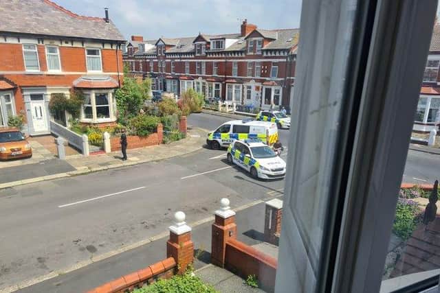 A man has reportedlybarricaded himself in a house onNorthumberland Avenue.