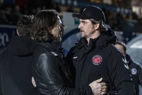 Joey Barton greets Wycombe boss Gareth Ainsworth when Fleetwood won at Adams Park in February