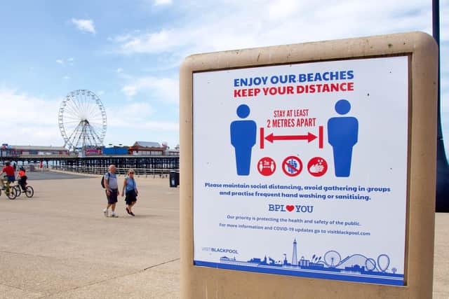 A sign on the Prom in Blackpool urging people to stay two metres apart (Picture: Michael Holmes for JPIMedia)