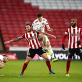 Danny Philliskirk in airborne action for Fylde in the FA Cup tie at Sheffield United in January