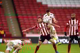 Danny Philliskirk in airborne action for Fylde in the FA Cup tie at Sheffield United in January