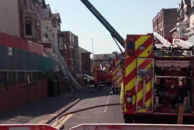 Alfred Street has been partially cordoned off as fire crews make the building safe