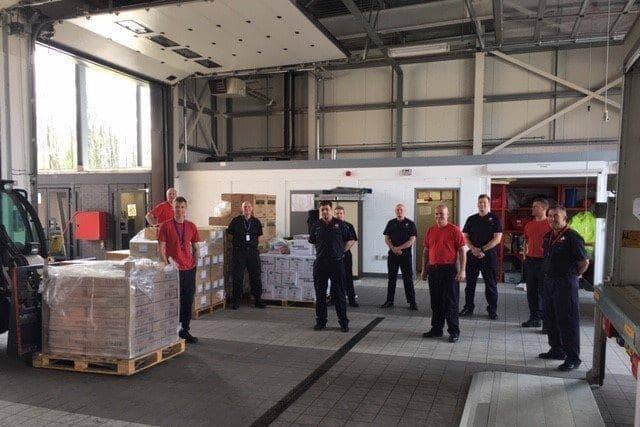 Lancashire Resilience Forum volunteers packing up personal protective equipment