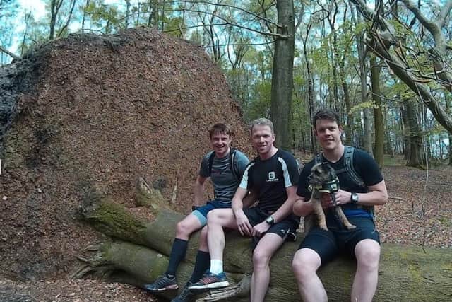 Preparing for the challenge. Pictured from left - Rob Simpson, Roger Grogan and James Fletcher with Herbie the dog.
