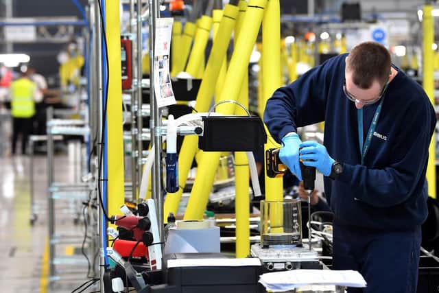 Engineers from Airbus working on a ventilator to help in the coronavirus crisis