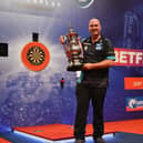 2019 World Matchplay champion Rob Cross with the Phil Taylor Trophy at Blackpool's Winter Gardens