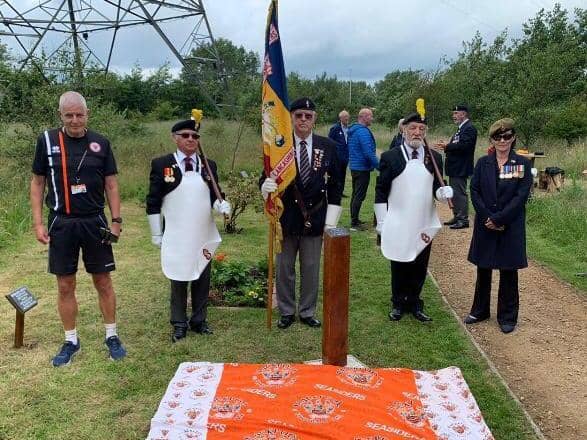 The unveiling of the Football Remembers plaque in the BFCCT garden