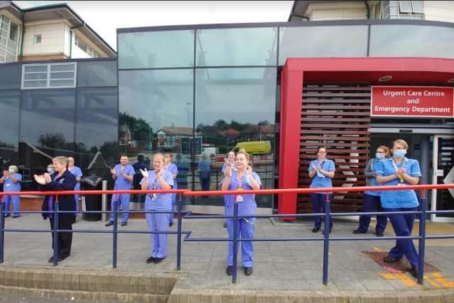Staff outside Blackpool Victoria Hospital today applaud the NHS on its 72nd birthday.