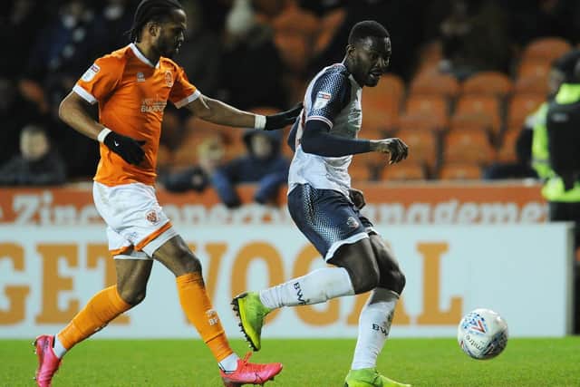 Bolton Wanderers, in action at Blackpool in February, will be in League Two next season with Ian Evatt in charge