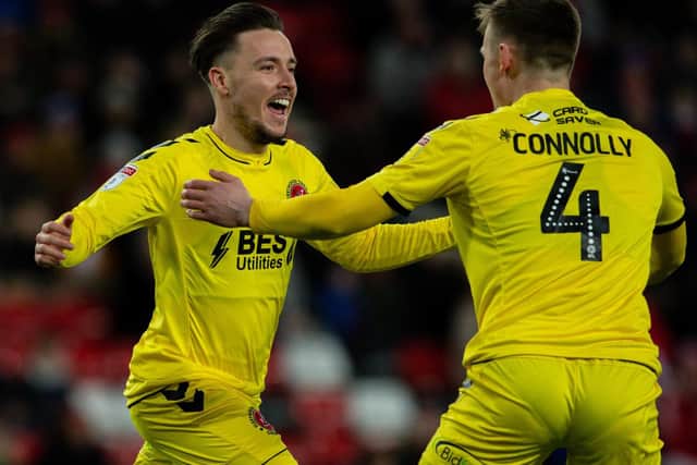 Barrie McKay (let) celebrates his first Fleetwood goal against Sunderland with Callum Connolly, himself the scorer of two goals in February