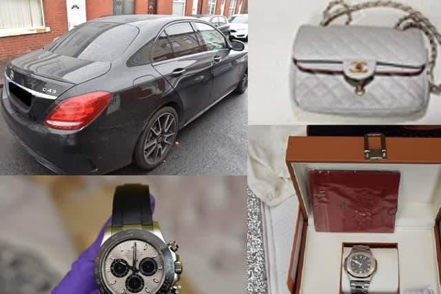 Lancashire Police seized a number of items including luxurywatches, designer handbags and a Mercedes car. Pic: Lancashire Police