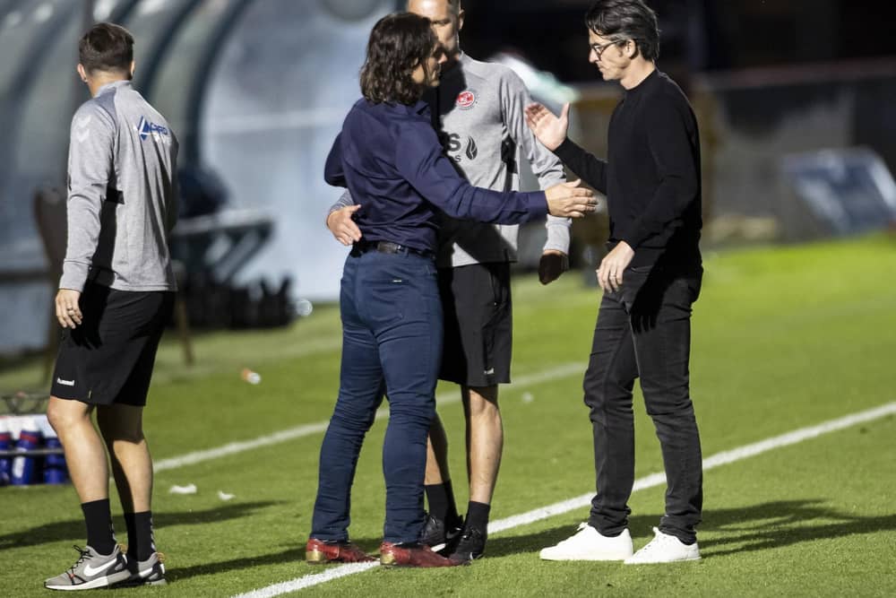 Joey Barton congratulates Wycombe boss Gareth Ainsworth at full-time on Monday