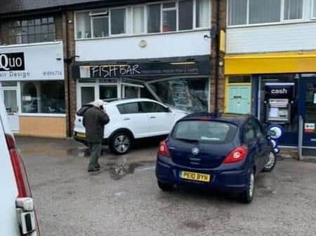 An elderly driver smashed through the front of The Fish Bar in Poulton yesterday afternoon.