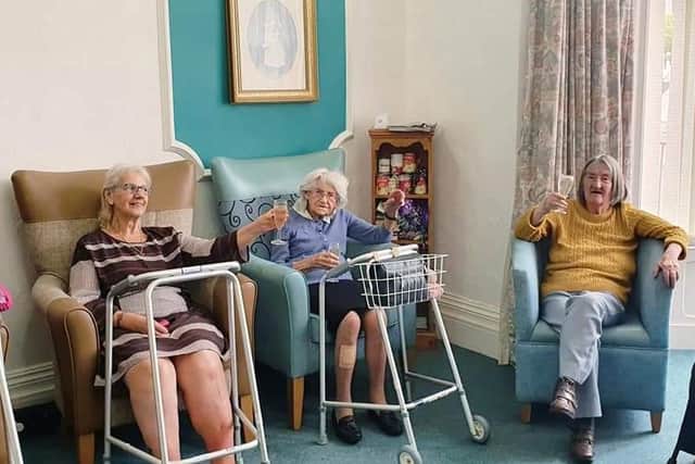 Residents enjoy a social drink together during the pandemic
