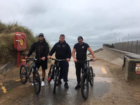 From left: Ryan Grainger, Ryan Smith and Matty Askin start one of their two charity bike rides from Starr Gate to Fleetwood Town FC