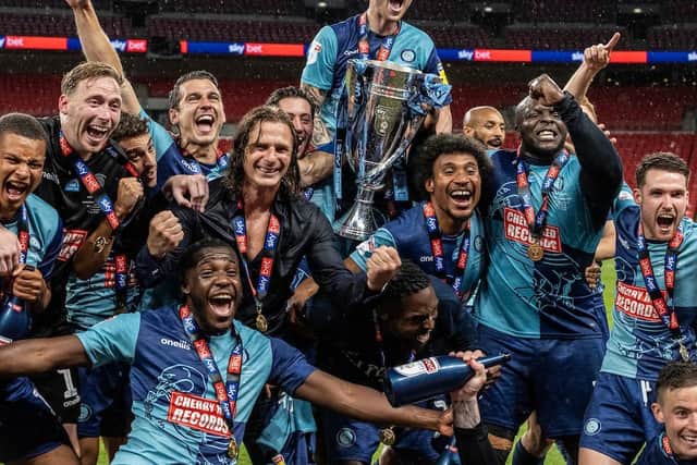 Wycombe celebrate their promotion to the Championship