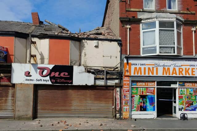 Bond Street has been partially closed in Blackpool after the gable end of a building began shedding bricks onto a neighbouring property this morning (July 21)